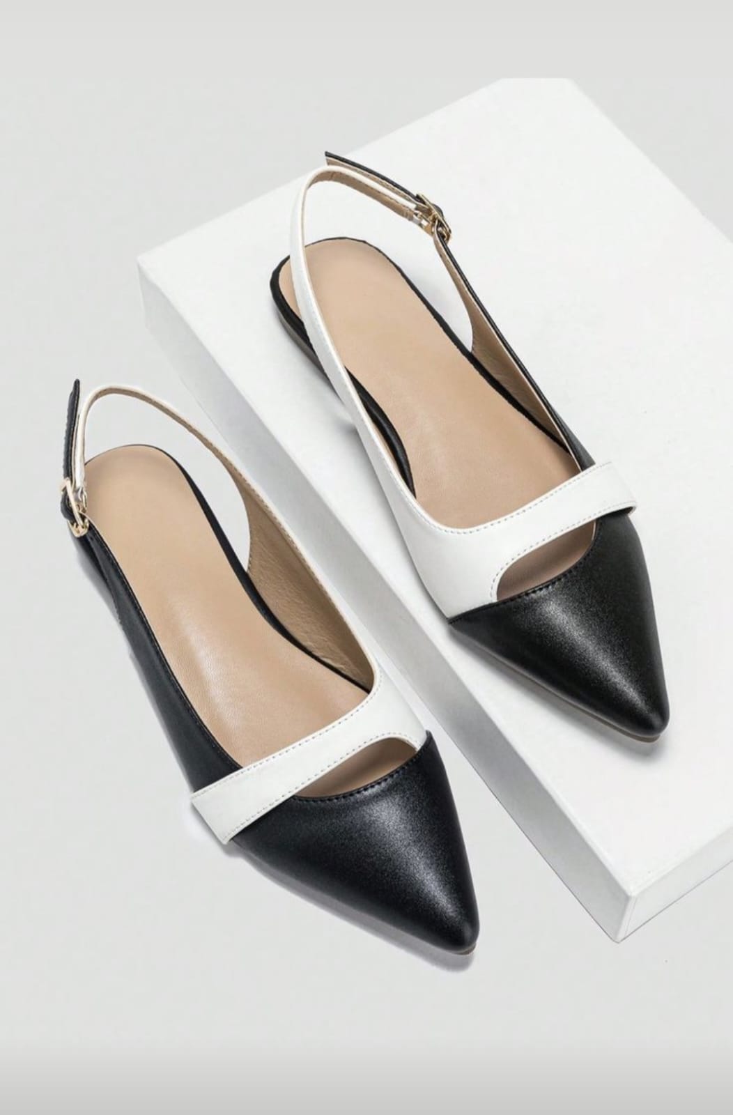 Monochrome Charm Pump – Black & White Elegance